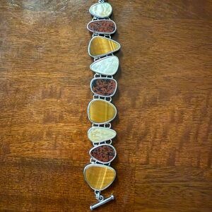 Elegant Multi-Stone Bracelet in Silver Setting